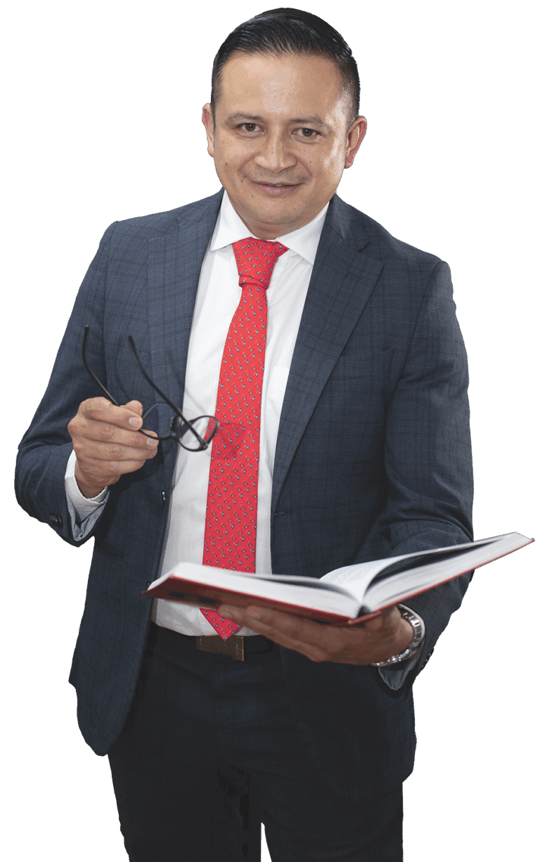 Óscar Cortés, abogado especialista en Derecho Inmobiliario y recuperación de activos, integrante del equipo de Lombardia Abogados, consultando un libro jurídico. Imagen profesional representando asesoría legal estratégica en recuperación de bienes.